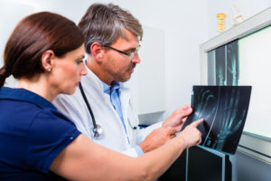 Doctor with x-ray - Walk-in Clinic Naples